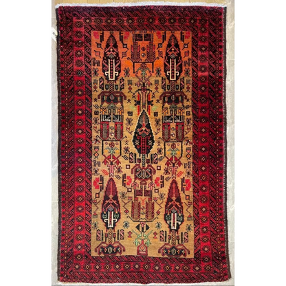 Vintage 1970s Persian Baluch rug with rich red border and geometric patterns in orange, black, beige and green