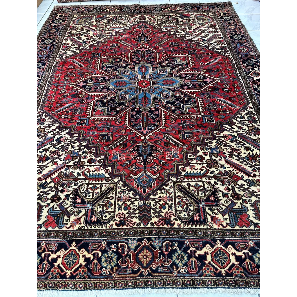Stunning Persian Heriz rug with geometric medallion design