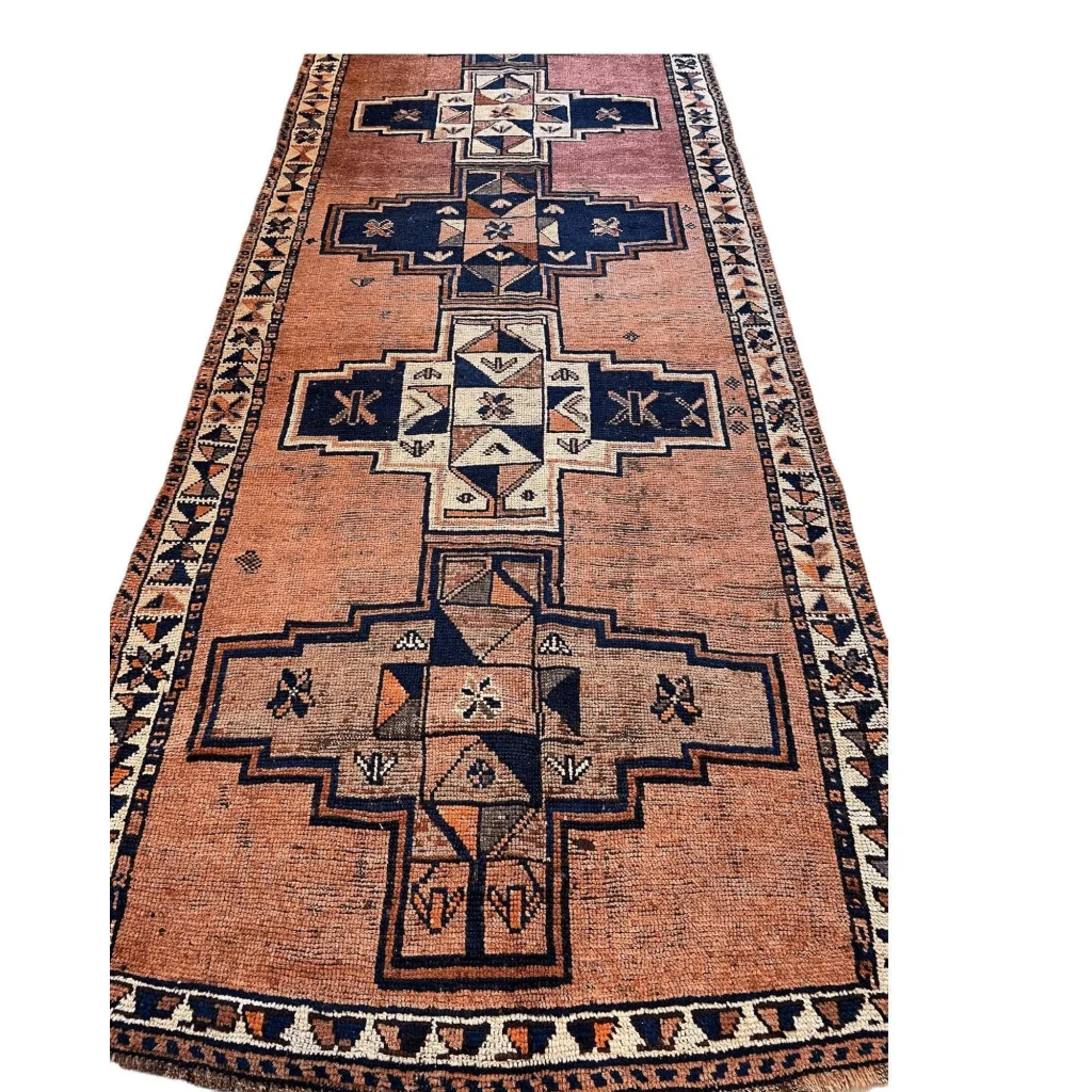 Vintage Persian Luri tribal runner rug with navy geometric cross on orange wool field