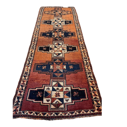Vintage Persian Luri tribal runner rug in bold orange, red, navy and cream geometrics