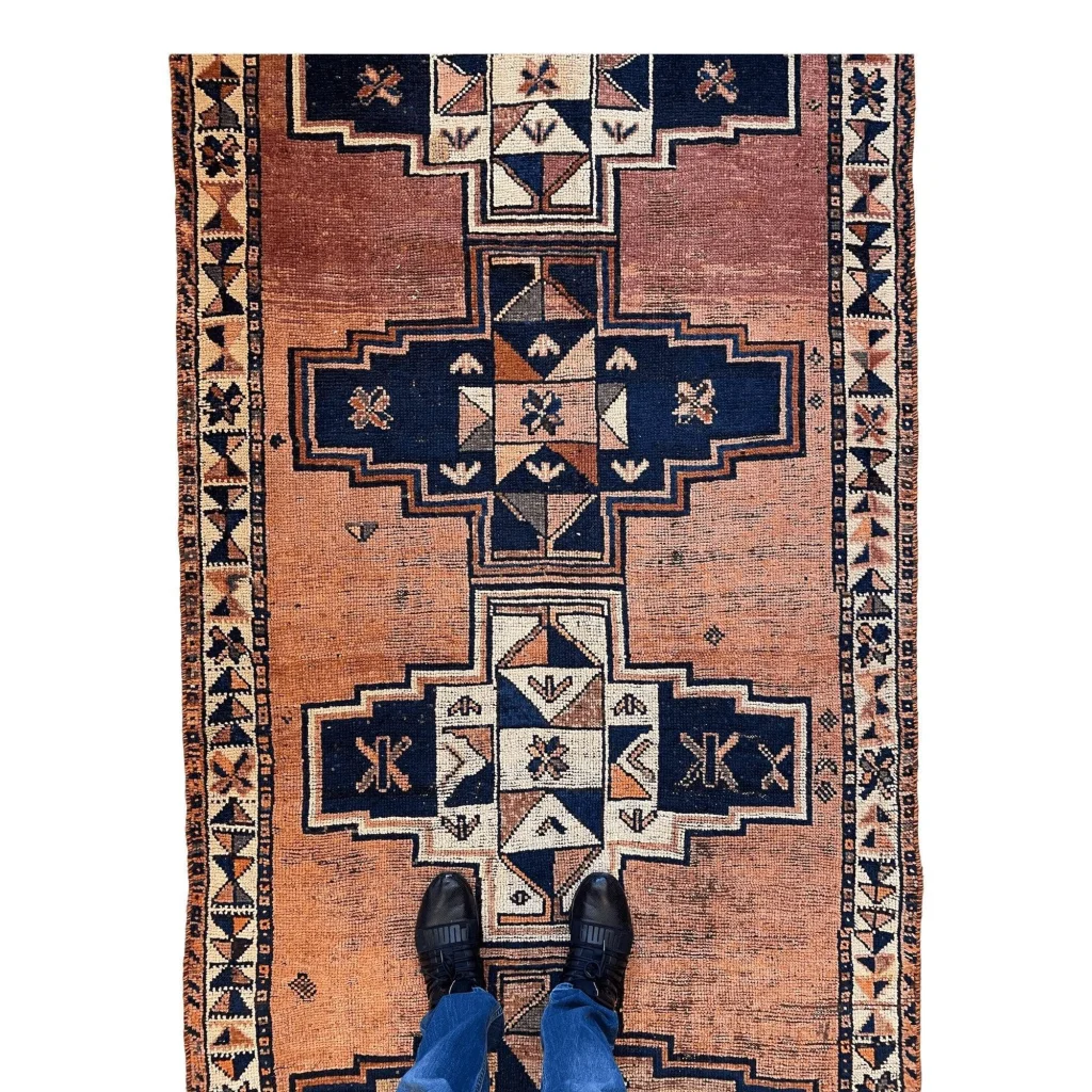 Vintage Persian Luri tribal runner rug in navy, terracotta and cream geometric pattern