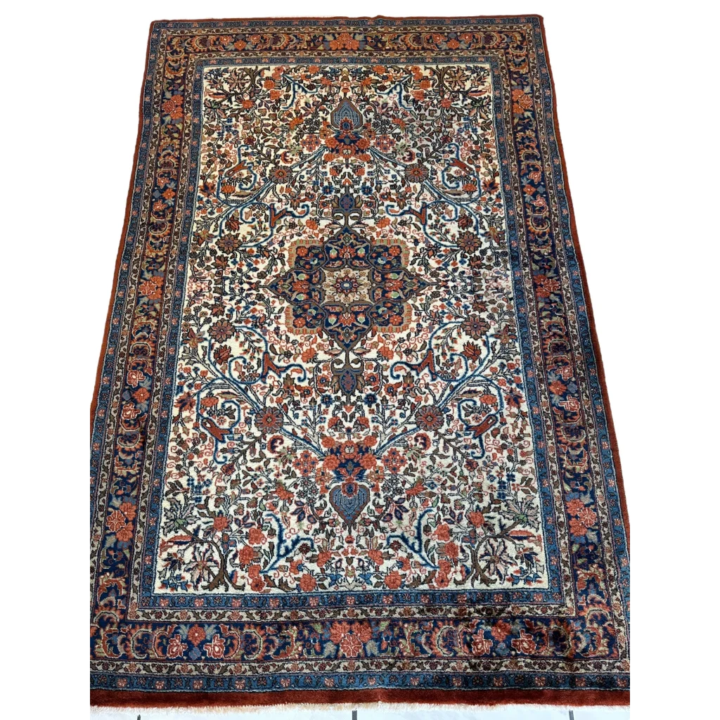 Stunning Persian Sarouk rug with floral medallion design