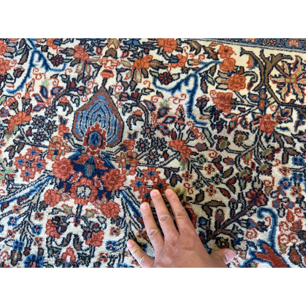 Hand on stunning Persian Sarouk rug with floral medallion design