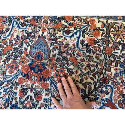 Hand on stunning Persian Sarouk rug with floral medallion design