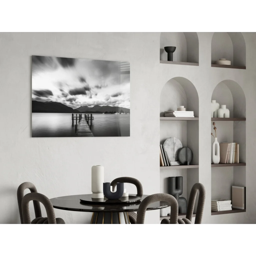 Black and white pier glass wall art with moody skies and mountains