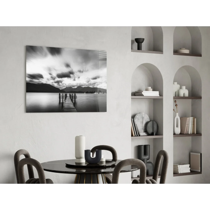 Black and white pier glass wall art with moody skies and mountains