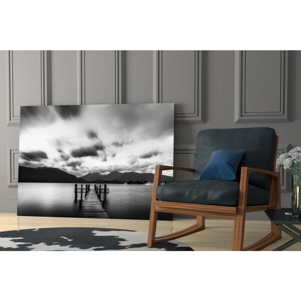 Stunning black and white pier glass wall art print on canvas with moody skies