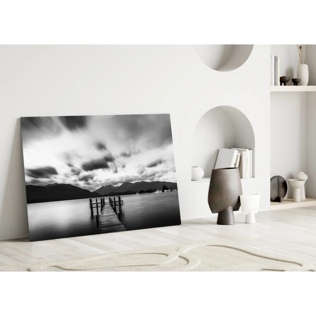 Black and white pier glass wall art with moody skies and mountains