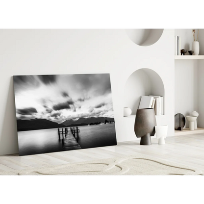 Black and white pier glass wall art with moody skies and mountains