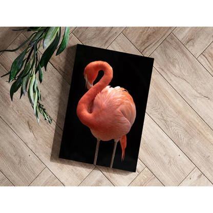 Stunning pink flamingo on black aluminum wall art with foliage