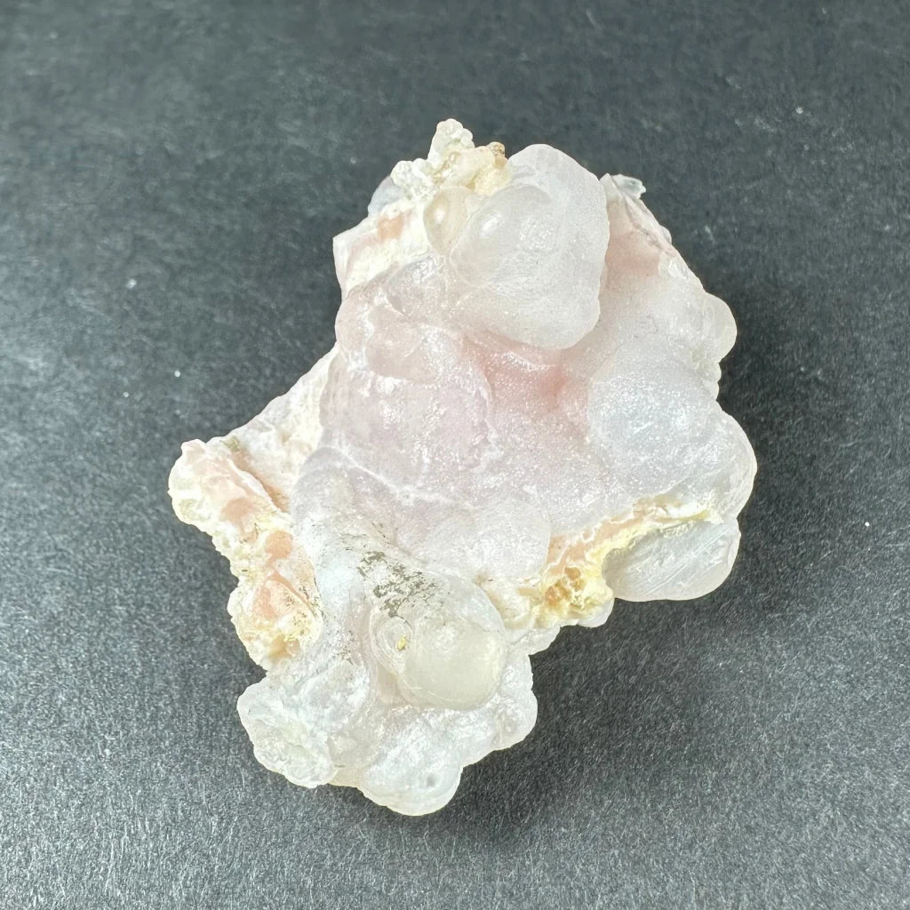 Stunning pink opal Ica geode with translucent crystalline layers
