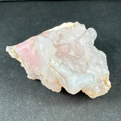 Stunning pink opal Ica geode with translucent pink white crystalline layers