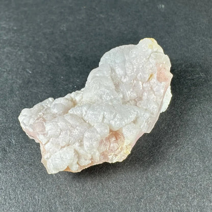 Stunning pink opal Ica geode with translucent pale pink and white crystalline layers