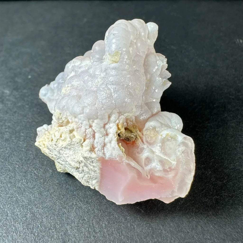 Stunning pink opal Ica geode with translucent pink and white crystalline layers