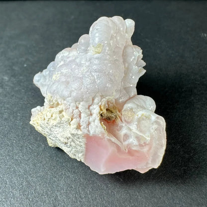 Stunning pink opal Ica geode with translucent pink and white crystalline layers