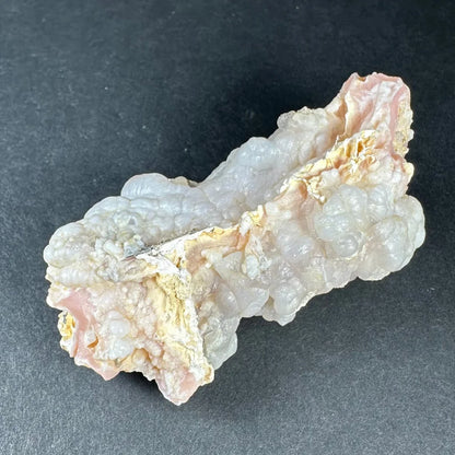 Stunning pink opal Ica geode with translucent bumpy pink and white crystalline layers