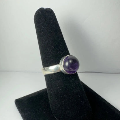 Sleek silver amethyst ring with deep purple bezel-set stone