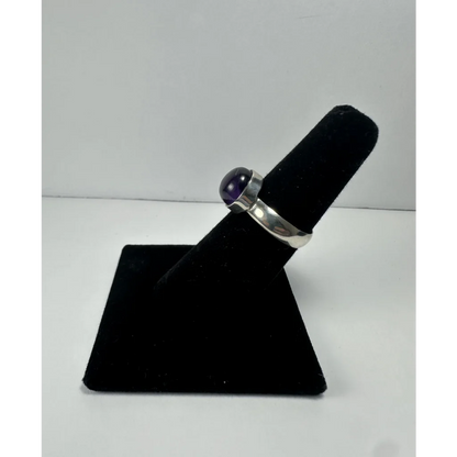Stunning silver amethyst ring with smooth purple gemstone