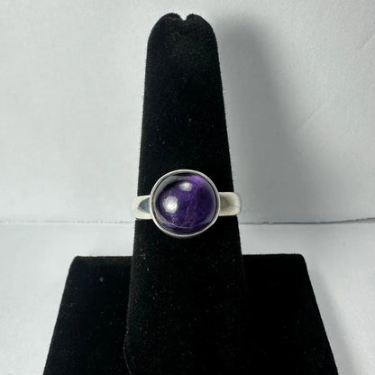 Stunning purple amethyst ring in sleek silver with bezel cabochon