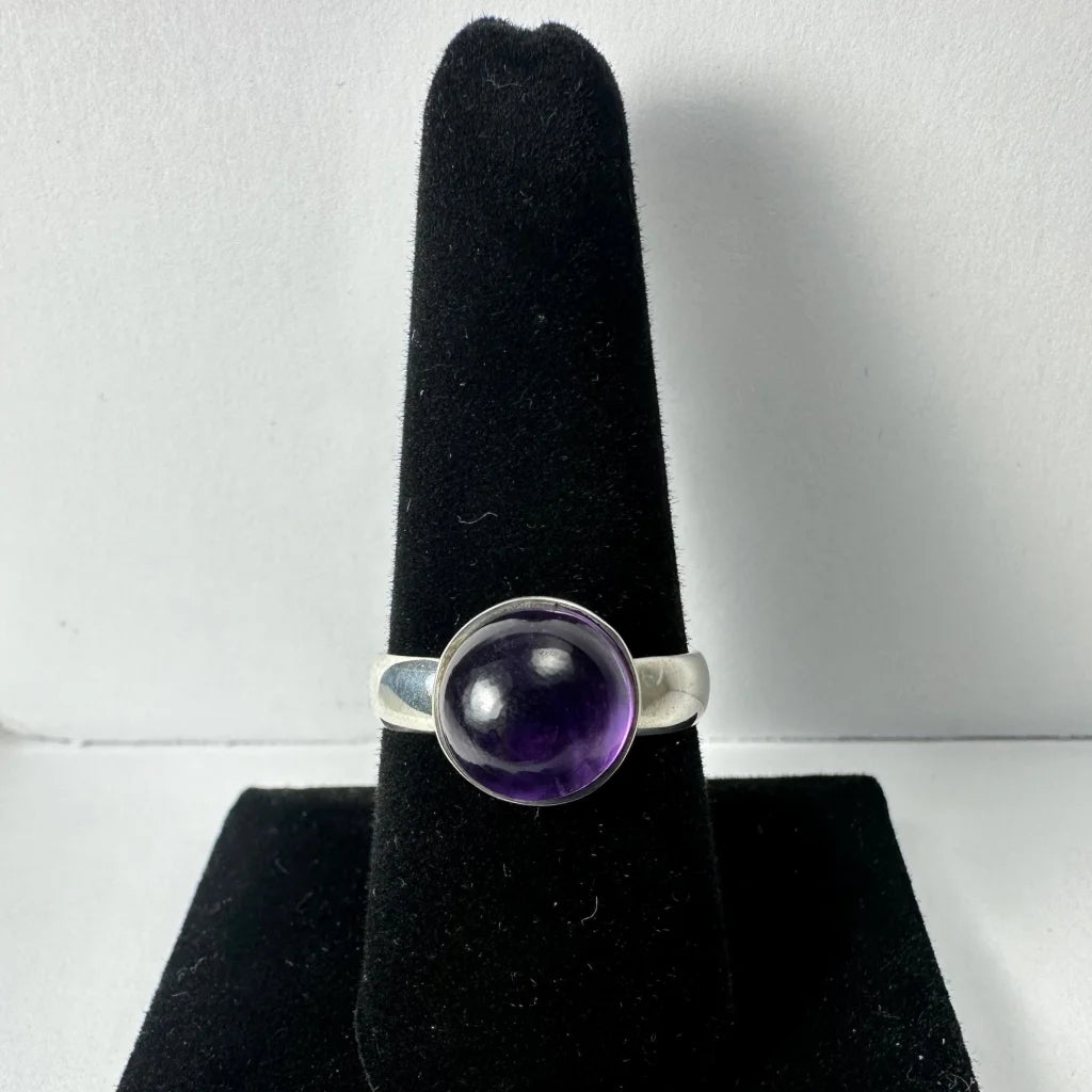 Sleek silver amethyst ring with deep purple gemstone