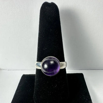 Sleek silver amethyst ring with deep purple gemstone