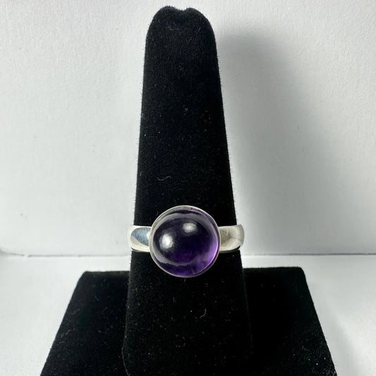 Sleek silver amethyst ring with deep purple gemstone