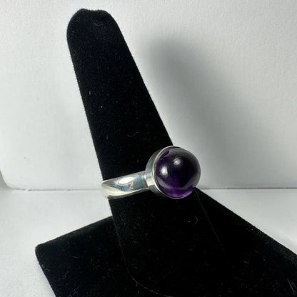 Sleek silver amethyst ring with deep purple spherical stone
