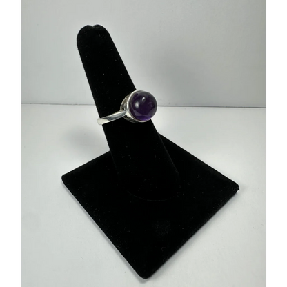 Sleek silver amethyst ring with smooth purple stone