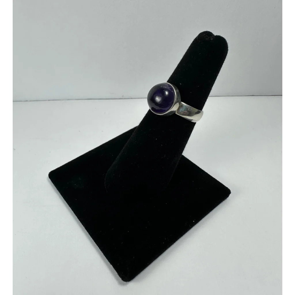 Stunning silver amethyst ring with deep purple bezel stone
