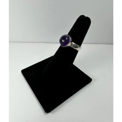 Sleek sterling silver amethyst ring with deep purple bezel-set stone