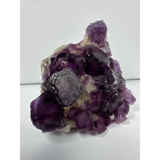 Vibrant purple cubic fluorite crystal cluster from China