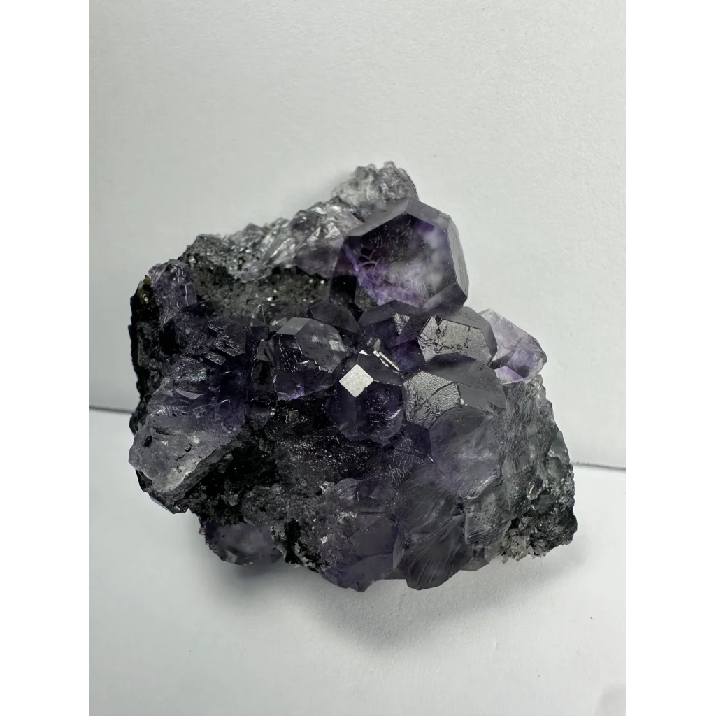 Stunning purple dodecahedral fluorite crystal cluster from China
