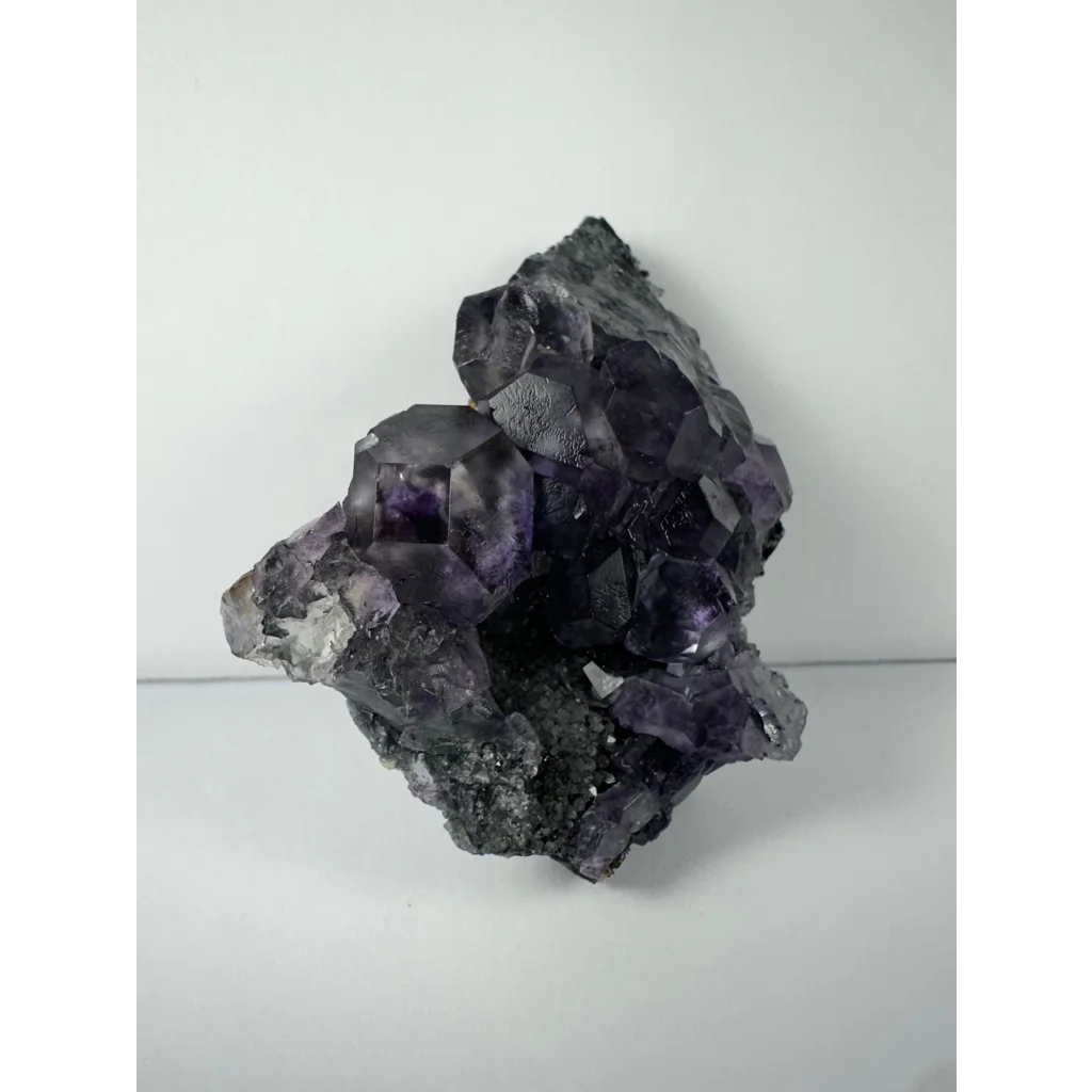 Stunning purple dodecahedral fluorite crystal cluster from China