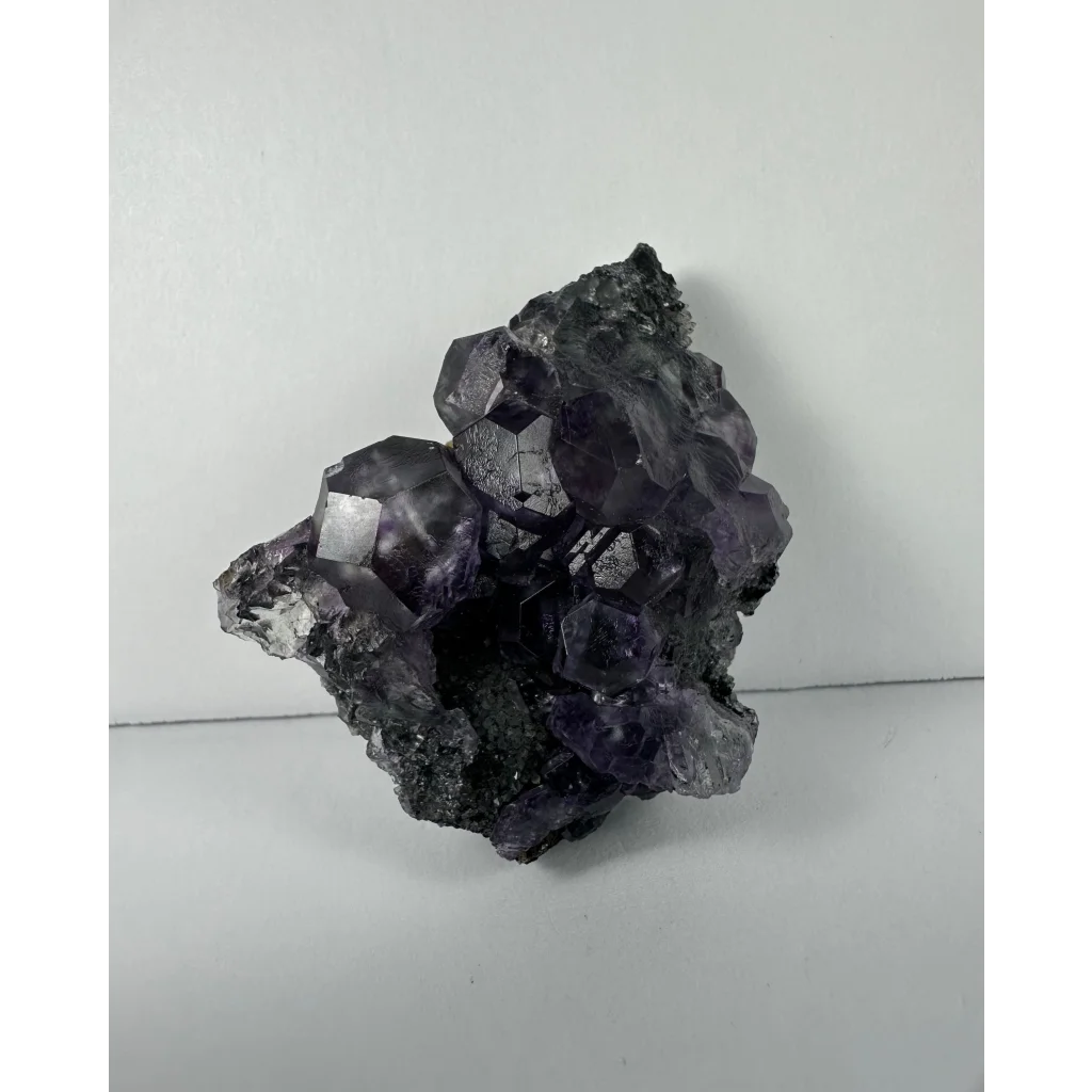 Stunning purple dodecahedral fluorite crystal cluster from China