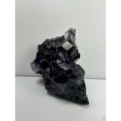 Stunning purple dodecahedral fluorite crystal cluster from China