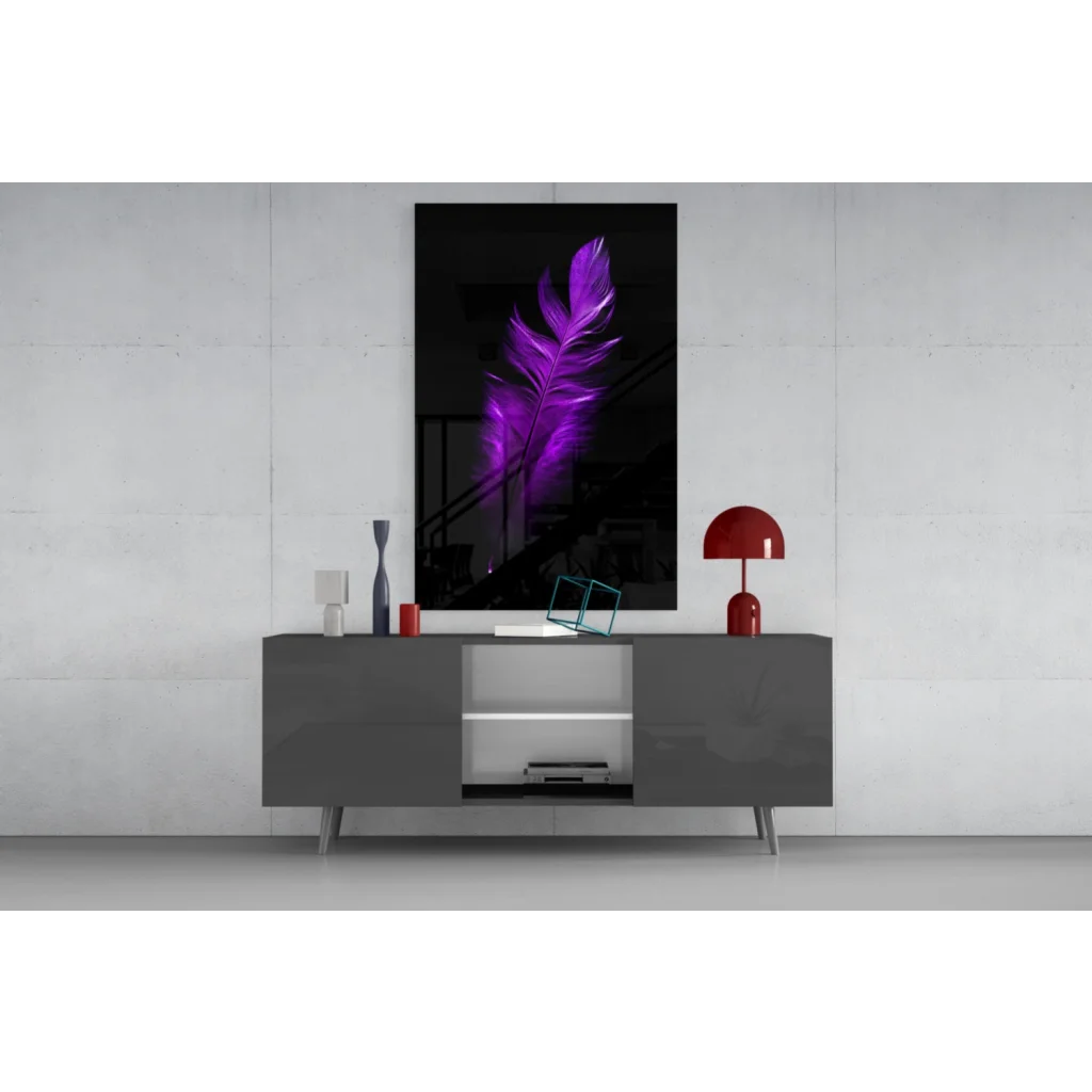 Vibrant purple feather glass wall art print on black frame above gray console