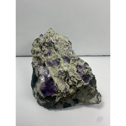 Stunning purple fluorite clusters on natural matrix from China