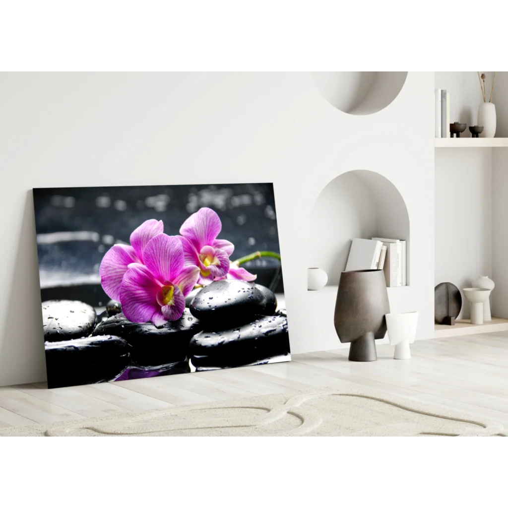 Stunning purple orchid glass wall art on black stones