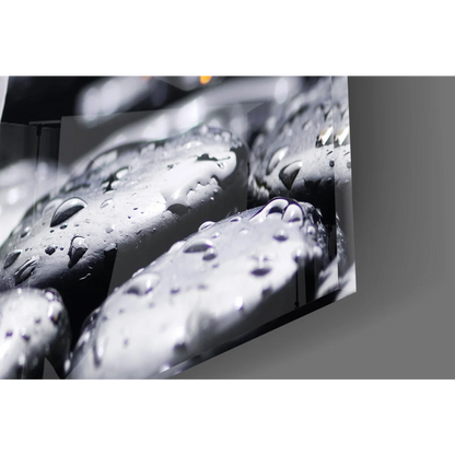 Black pebble wall art with water droplets in stunning purple orchid glass wall