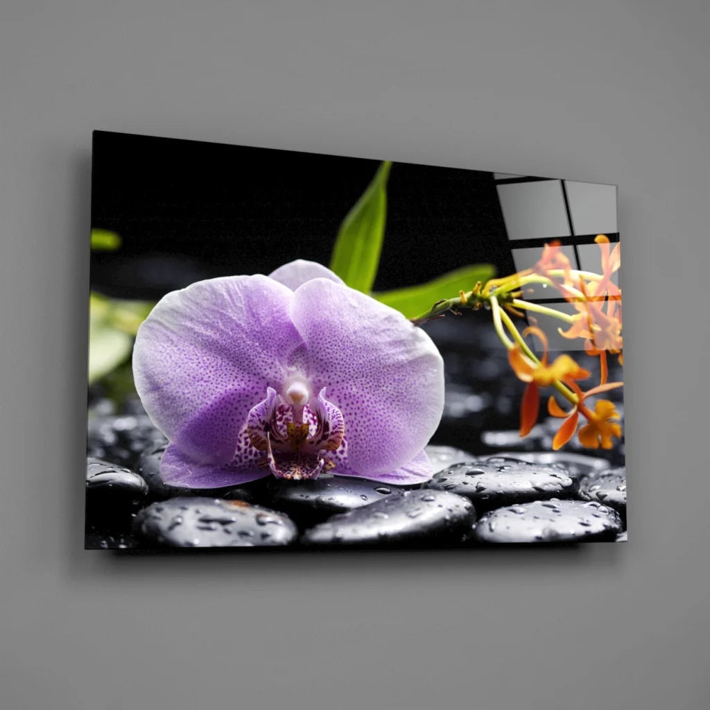 Stunning purple orchid glass wall art with zen pebbles