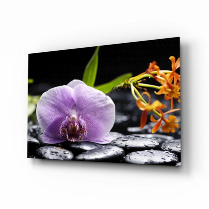 Stunning purple orchid glass wall art with zen pebbles