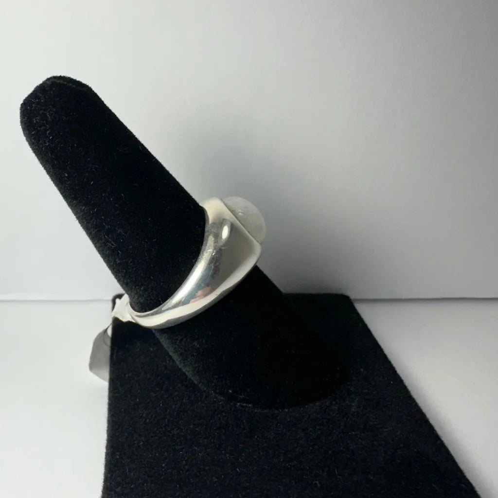 Stunning silver moonstone ring with smooth band and translucent white stone