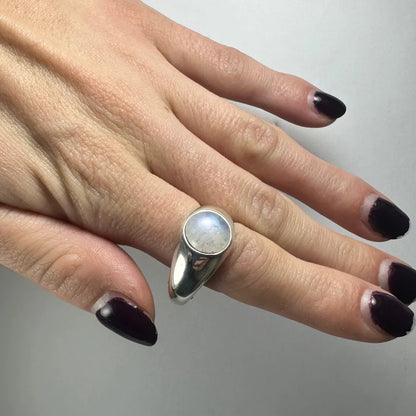 Sleek sterling silver moonstone ring with stunning oval rainbow stone