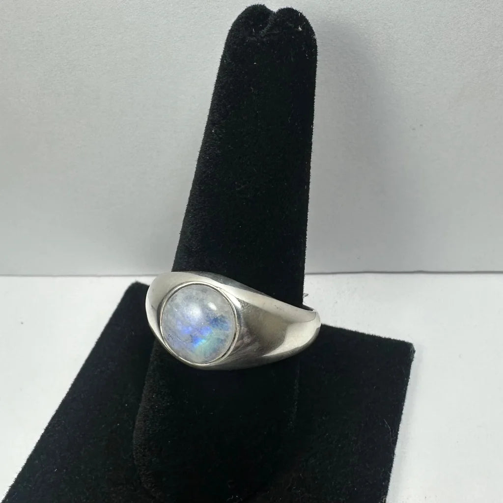 Sleek silver moonstone ring with oval rainbow gem