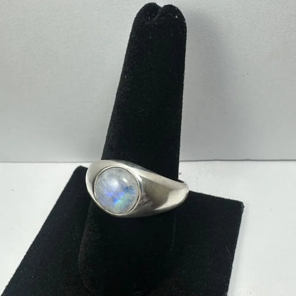 Sleek silver moonstone ring with oval rainbow gem