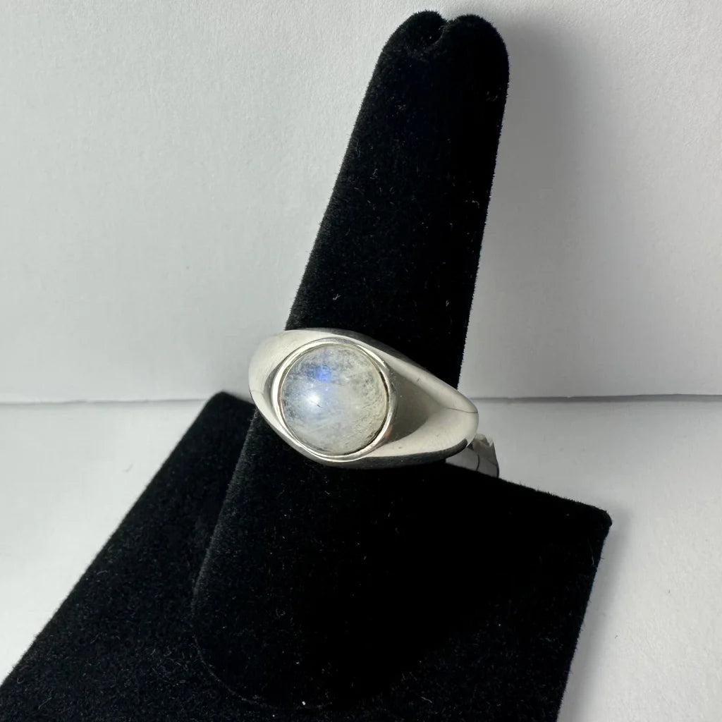 Sleek sterling silver moonstone ring with oval iridescent gem