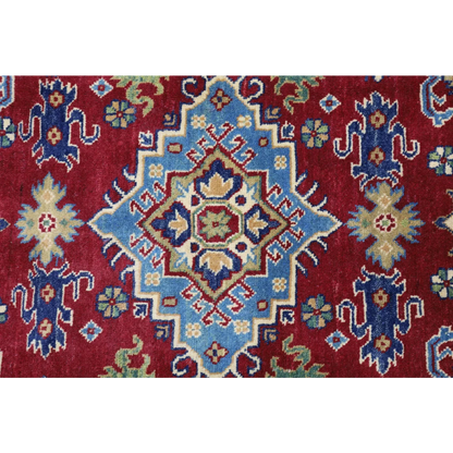 Stunning red Afghan Kazak rug with cotton foundation and blue medallion