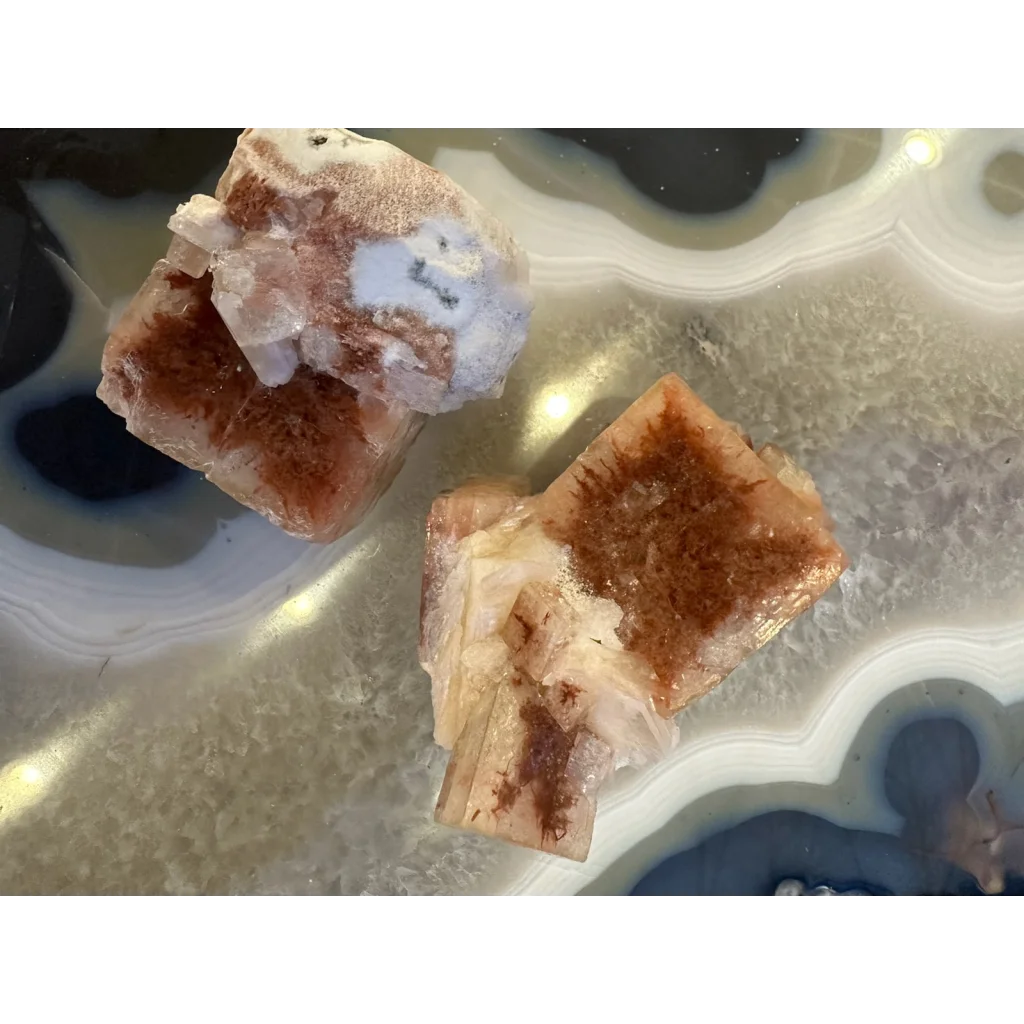 Stunning red apophyllite cube from India with purple streaks on agate