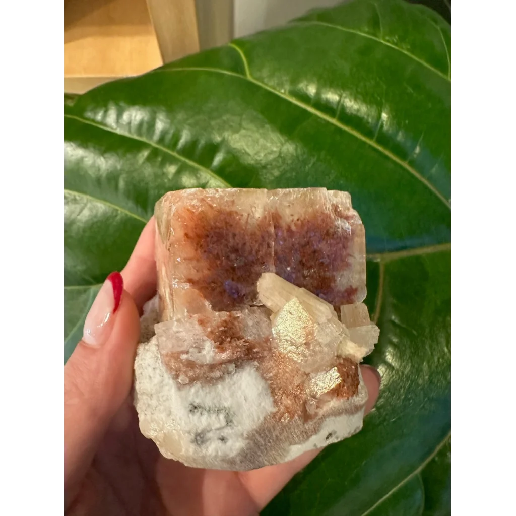 Stunning red apophyllite cube from India with purple streaks and amber crystal cluster