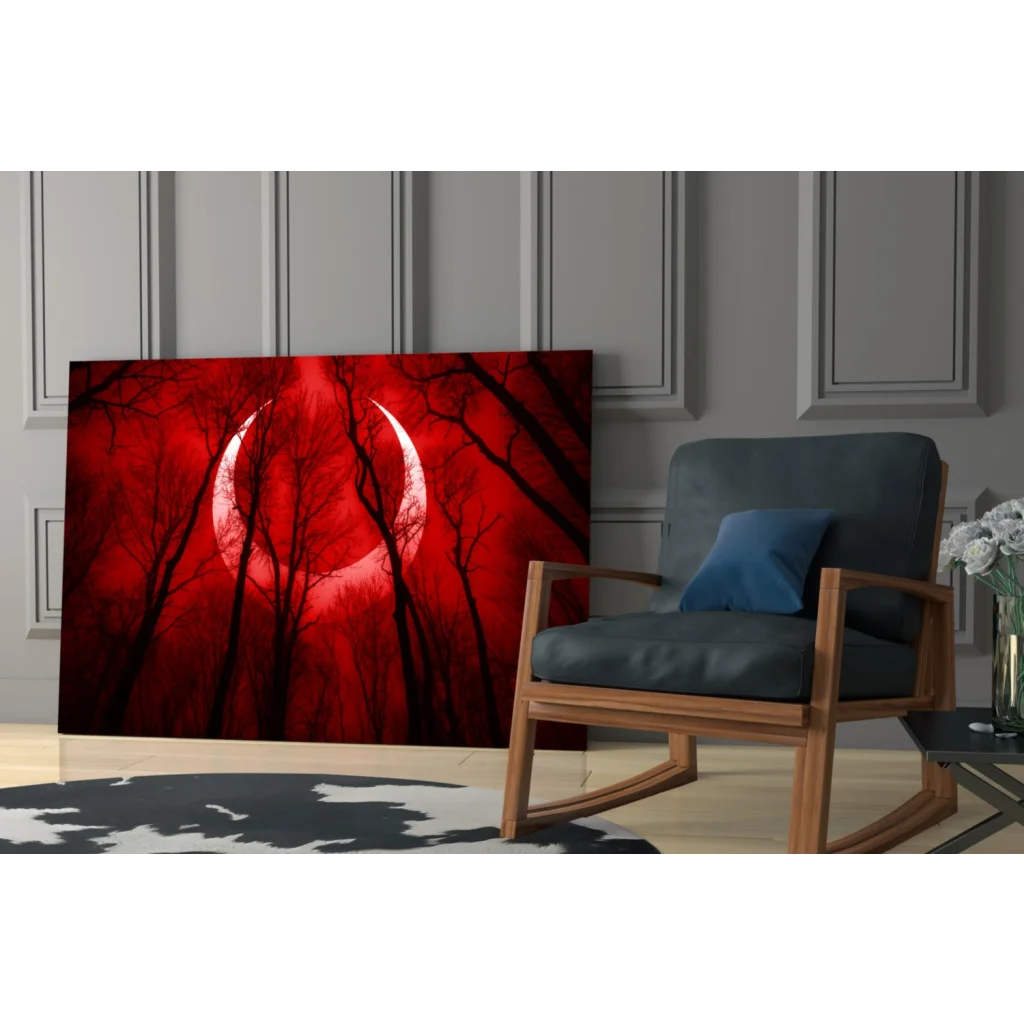 Stunning red crescent moon glass wall art with black tree silhouettes